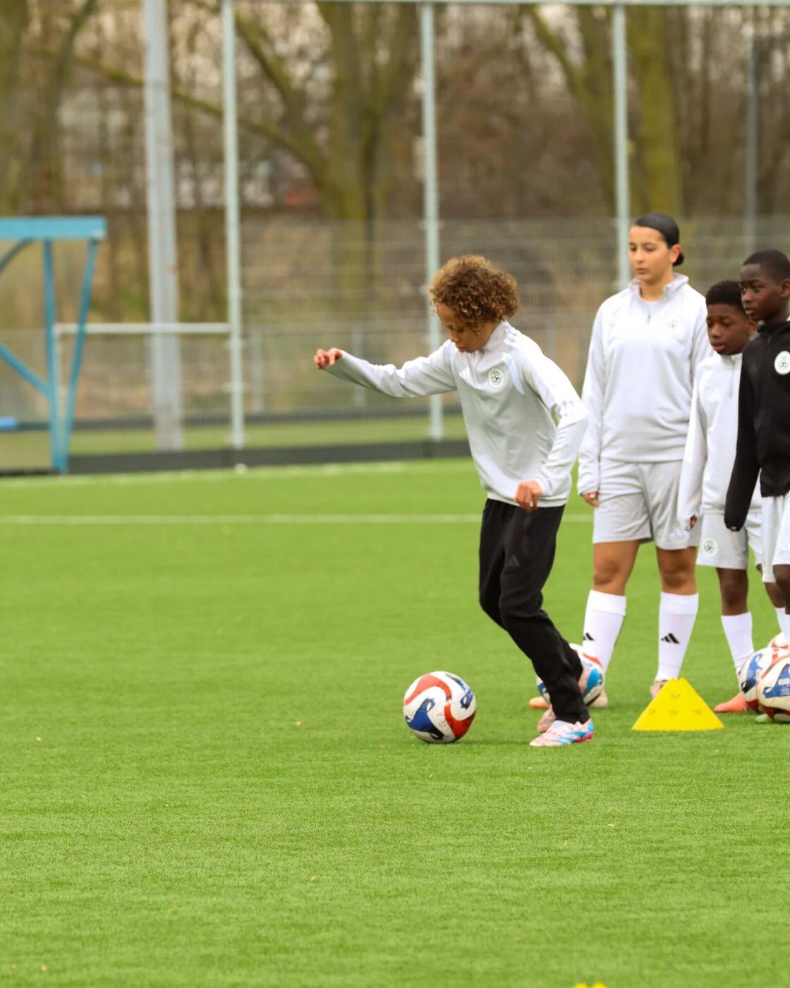 Trainers op het veld